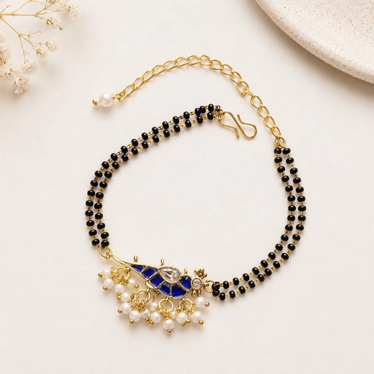 Handcrafted Double Layer Black Bead Hand Mangalsutra In Paachi Kundan Bird Charm