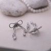 The Diamanté Bow Tassel Earrings