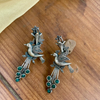 Silver Oxidised Bird On Branch Earring