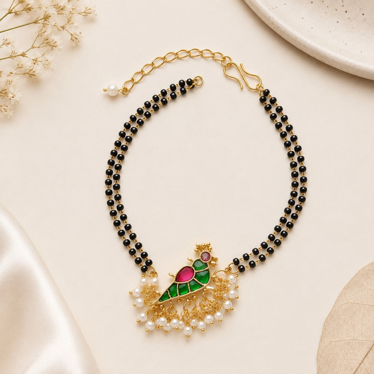 Handcrafted Double Layer Black Bead Hand Mangalsutra In Paachi Kundan Bird Charm