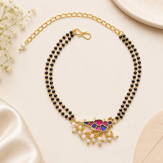Handcrafted Double Layer Black Bead Hand Mangalsutra In Paachi Kundan Bird Charm