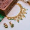 Gold jewelry set with tiara, necklace, and earrings on a white background