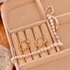 Rose Gold Snake Huggie Hoops with Green Crystal Eyes - Putstyle